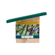 A simple wooden birdfeeder designed to hold a peanut butter jar, with a green slanted roof for weather protection.